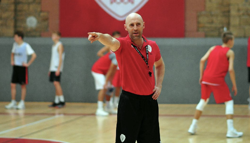 Basketball Coach Instructing