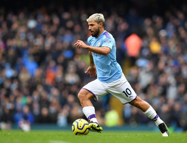 Manchester City's Argentinian striker Sergio Aguero runs with the ball during the English Premier League football match between Manchester City and Aston Villa at the Etihad Stadium in Manchester, north west England, on October 26, 2019. 