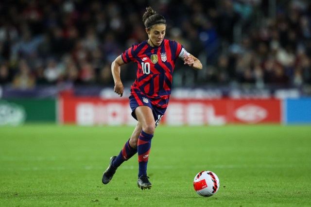 Carli Lloyd #10 of United States dribbles the ball against Korea Republic