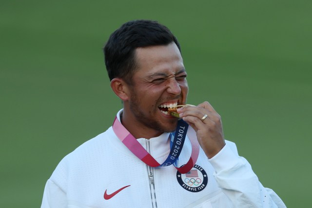Xander Schauffele of Team United States celebrates with the gold medal during the medal ceremony after the final round of the Men's Individual Stroke Play on day nine of the Tokyo 2020 Olympic Games at Kasumigaseki Country Club on August 01, 2021 in Kawagoe, Saitama, Japan