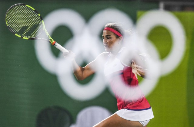 Monica Puig of Puerto Rico is in action