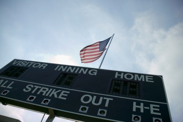 USA Flag Over Baseball Scoreboard