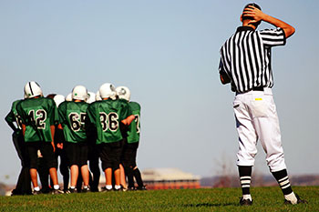 Football players and referee