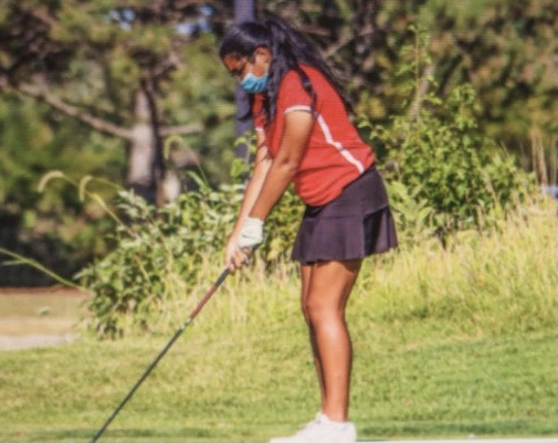 Aparna Ramakrishnan playing golf 