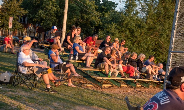Fans Sit in Bleachers