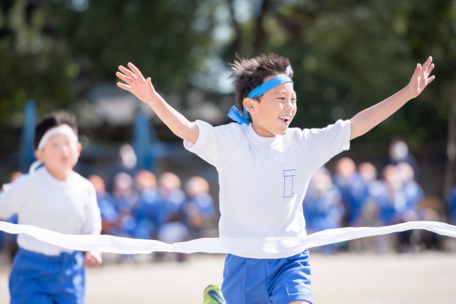 Child crossing the finish line