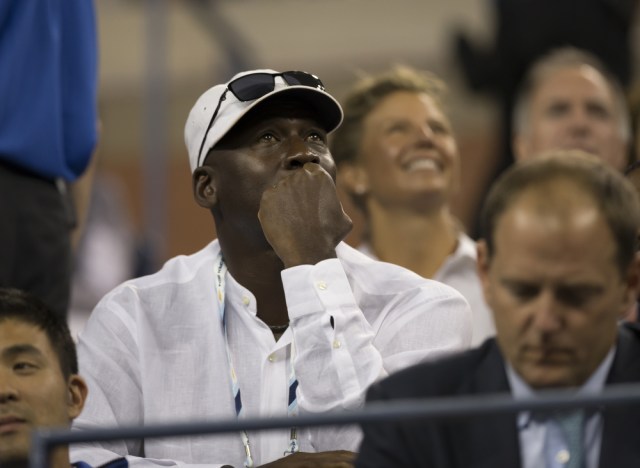 Michael Jordan attends 1st round match between Roger Federer of Switzerland and Marinko Matosevic