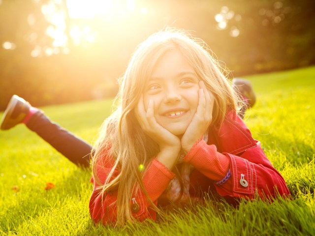 Girl laying on grass